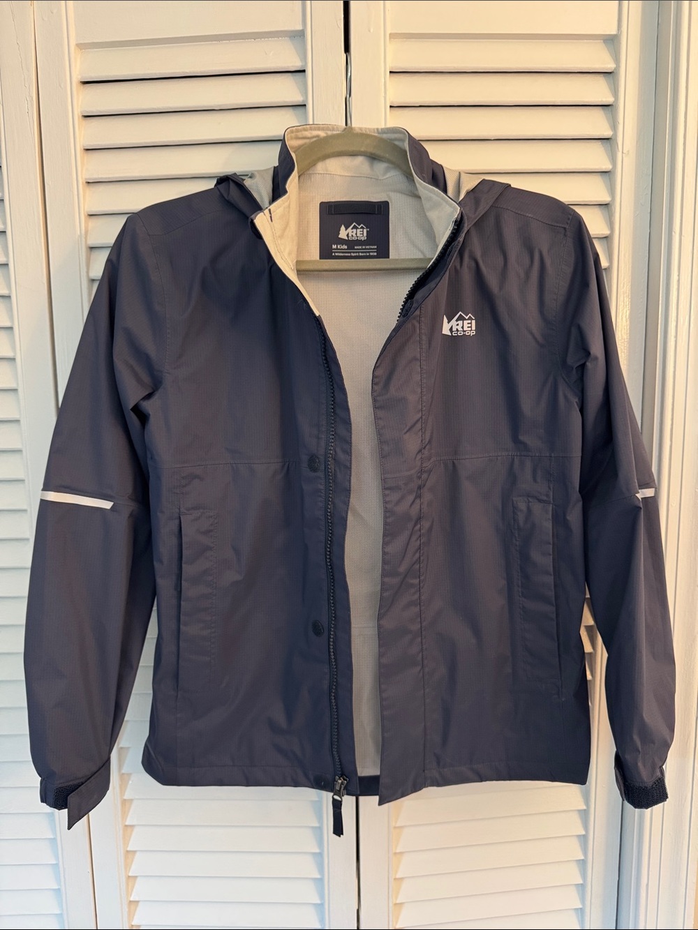 REI Boys Navy Hooded Raincoat with Reflective Accents